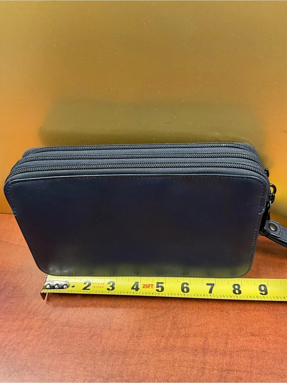 Tumi Navy Leather Toiletry Wrist Pouch
